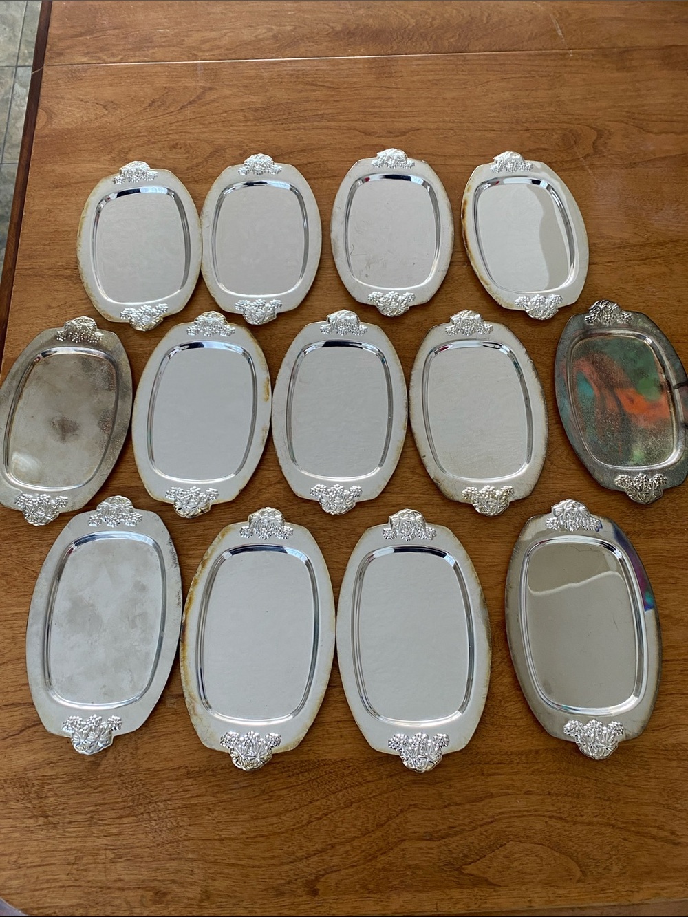 Set of 13 Silver-Tone Decorative Oval Trays